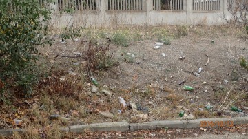 Бреста 13 вдоль забора